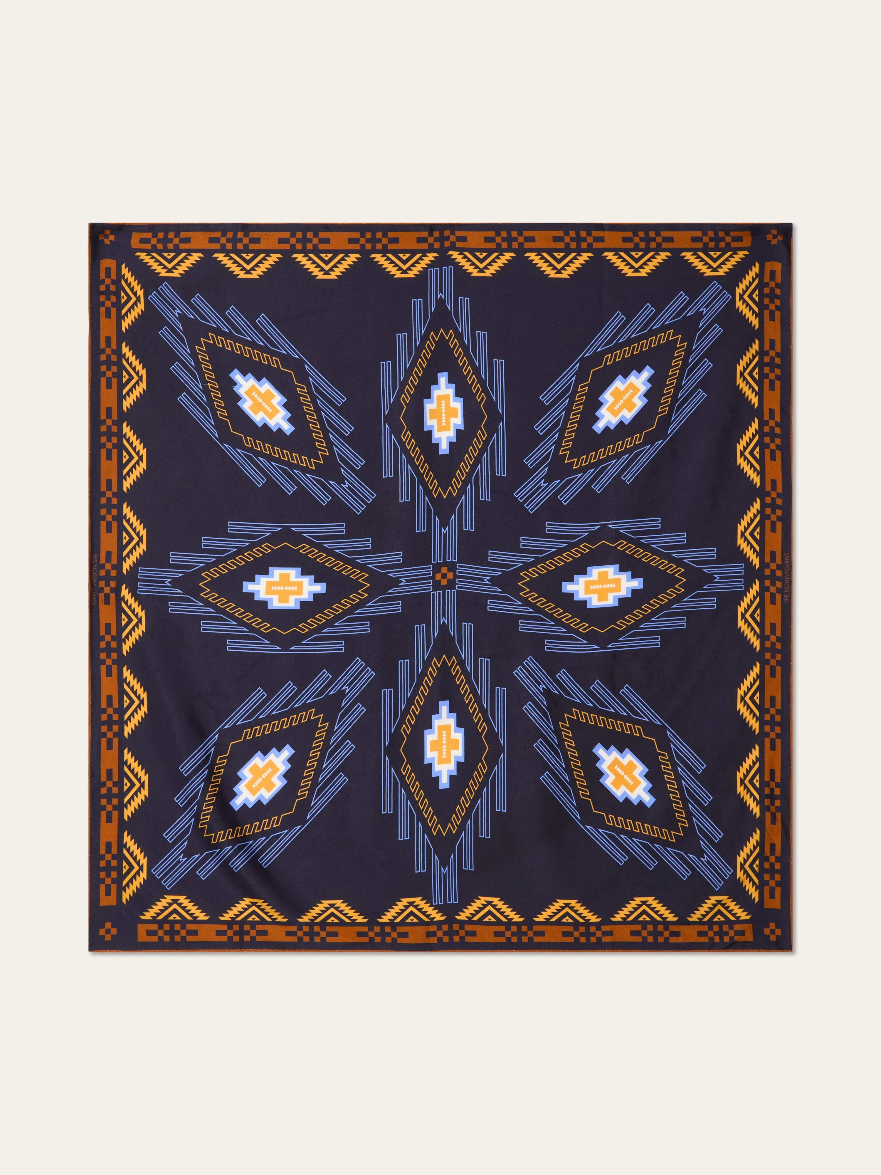 We Norwegians | FW25 | Pioneer Silk Scarf_Navy blue | Scarf with printed motifs | Shot against an off-white background